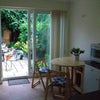 Photo 2: Kitchenette & patio