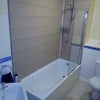 Photo 4: One of two shared bathrooms. weekly cleaner