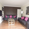 Photo 6: Living room with plenty of space, TV and sofas.