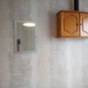 Photo 2: Storage cabinet with wall mounted mirror. 