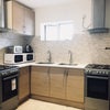 Photo 9: Main common kitchen