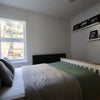 Photo 2: Bright freshly decorated double bedroom with double wardrobe, garden views and a super comfortable b