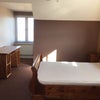Photo 2: Brand new 13.5 tog anti allergy bedding | thermal curtains on entry | solid wooden furniture | 