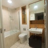 Photo 5: Large bathroom with cupboard space, shower bath and towel rack radiator. 