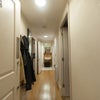 Photo 8: Corridor entry into flat