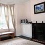 Photo 4: Living room with cable t.v.