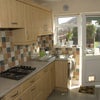 Photo 5: the well equiped kitchen has integral washing machine, dishwasher, fridge freezer leading onto decki