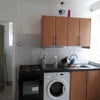 Photo 9: Cool Kitchen with Washing Machine, Dryer, Fridge Freezer