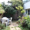 Photo 4: Garden (Is bigger than my rubbish photo ;) We can also access a bigger garden for parties :)