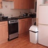 Photo 5: Shared kitchen/living
