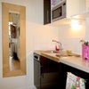Photo 3: Great Compact and Sleek Kitchen