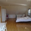 Photo 3: The room with doors on to balcony