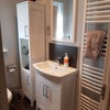 Photo 8: Lots of storage and large heated towel rail. Waterfall tap.  Shaver point. 