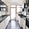 Photo 4: The kitchen, all done, nice and clean and tidy with all the mod cons & separate utility room
