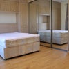 Photo 3: Bedroom (view towards mirror fronted built in wardrobes)