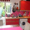Photo 9: Kitchen leads to garden.