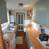 Photo 4: Fully fitted kitchen with washing machine and tumble drier
