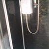 Photo 5: Shower is Electric with Black Galaxy & Chrome Surround