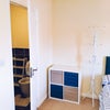 Photo 3: Shelving unit and ensuite bathroom