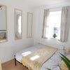 Photo 2: Lovely light modern room with double bed and desk overlooking garden