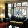 Photo 1: Living room - looking towards window (south facing)