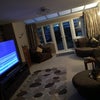 Photo 2: Communal Living Room with 75? TV (spot the houston on the sofa !)