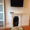 Photo 7: Fire place and wall TV