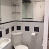 Photo 2: Bathroom with shower , basin and toilet and storage