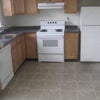 Photo 2: Kitchen very similar