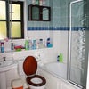 Photo 5: There is a smart bathroom with shower