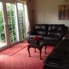Photo 9: Lounge area leading to extensive garden.
