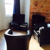 Photo 6: Cosy sitting room now with sofa and tv