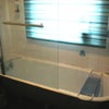 Photo 5: Original 1930s roll-top bath with new shower screen