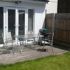 Photo 7: South facing garden with patio and barbecue