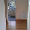 Photo 1: Sitting room looking through to kitchen