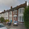 Photo 7: Exterior of flat (Red door) on quiet residential road