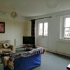 Photo 4: Living room, with balcony