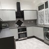 Photo 3: brand new modern kitchen
