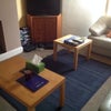 Photo 2: Communal living room with TV