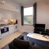 Photo 4: Living Room leading to open plan kitchen