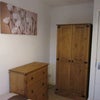 Photo 5: Double bedroom with 3 piece bedroom set, double leather effect bed, bedside lamp and curtains