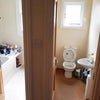Photo 5: Downstairs bathroom and toilet