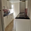 Photo 2: Kitchen area