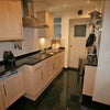 Photo 2: Well equipped kitchen with built-in appliances