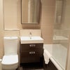 Photo 2: Two bathrooms with bath/showers