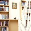 Photo 5: Bookshelves on staircase.