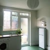Photo 5: kitchen with door onto garden