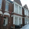 Photo 7: Front of House with driveway