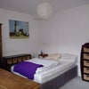 Photo 2: Double bed with table, two chest of drawers and a bookshelf