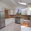 Photo 2: Kitchen with Range cooker and American fridge